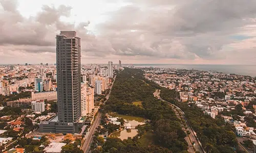 Aerial view of cityscape with tall buildings.
